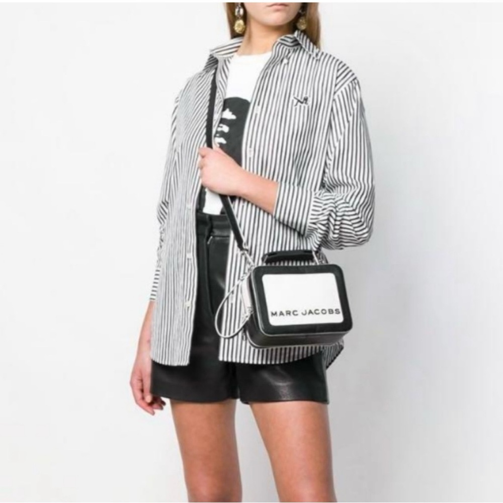 Marc Jacobs Black and White Crossbody Bag with Adjustable Strap and Flap Closure